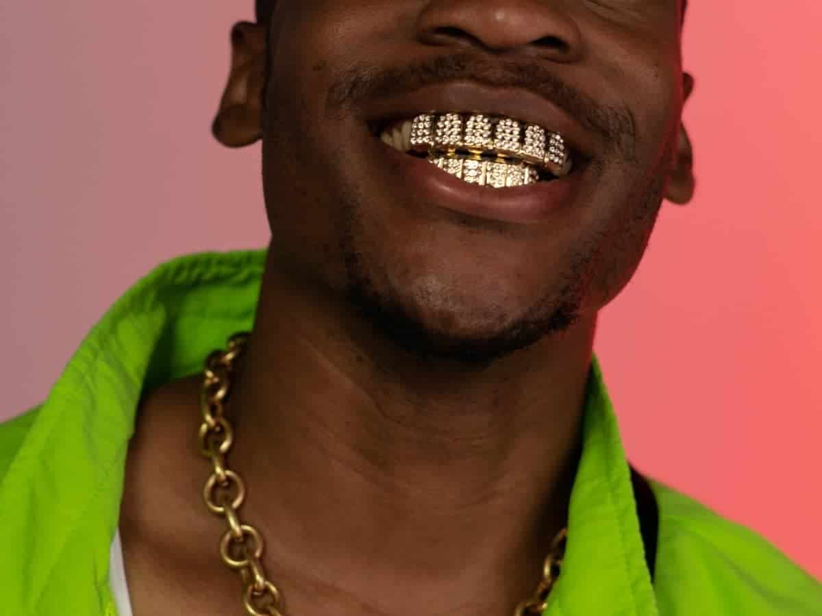 How Do Grillz Stay on Your Teeth? (All You Need to Know)