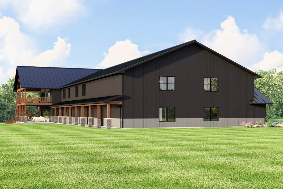 Modern house plan exterior with dark metal siding, a wrap-around porch with stone columns, and upper-level balcony.