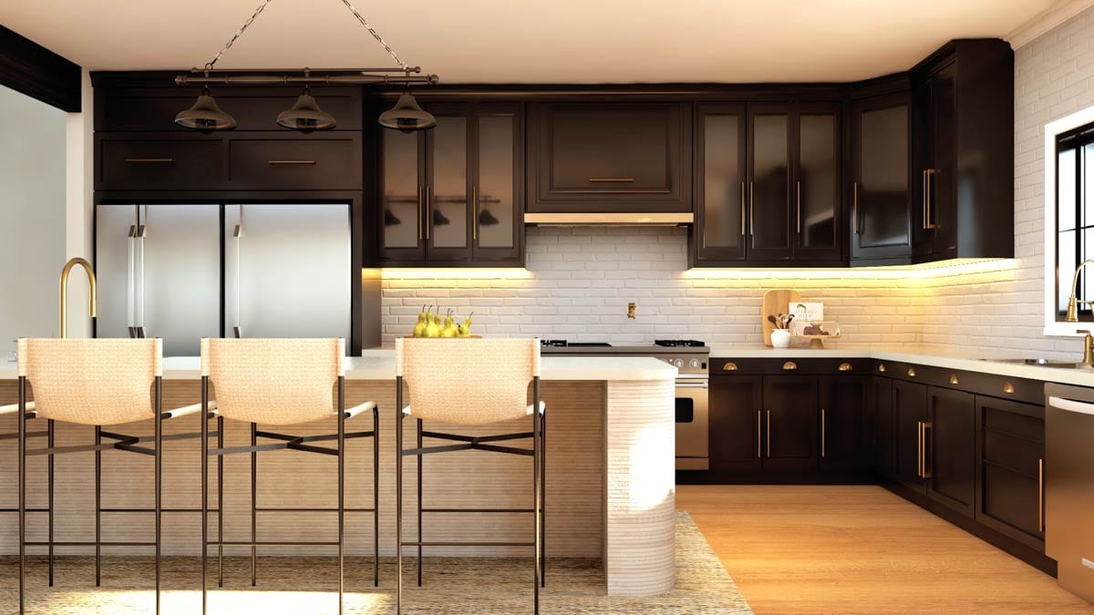 Kitchen with dark cabinets, white subway tile backsplash, stainless steel refrigerator, and island with bar stools.