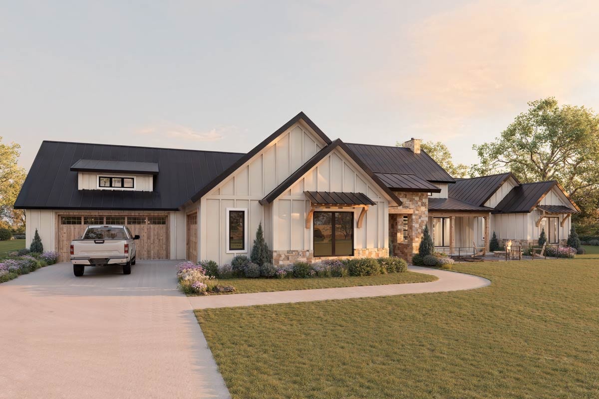 Modern Farmhouse house plan exterior with a metal roof, gabled dormers, stone accents, and a three-car garage.